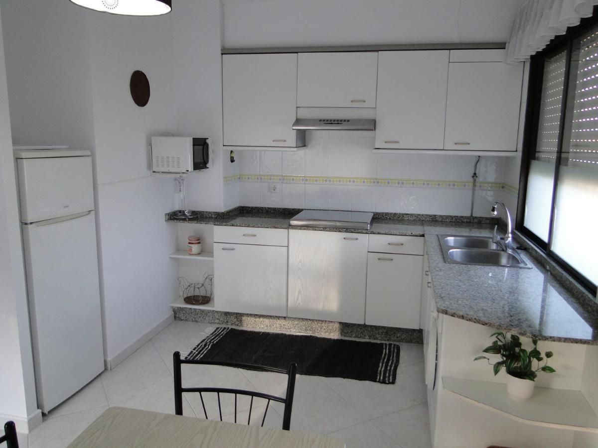 Apartamentos Blanco O Grove Exteriör bild