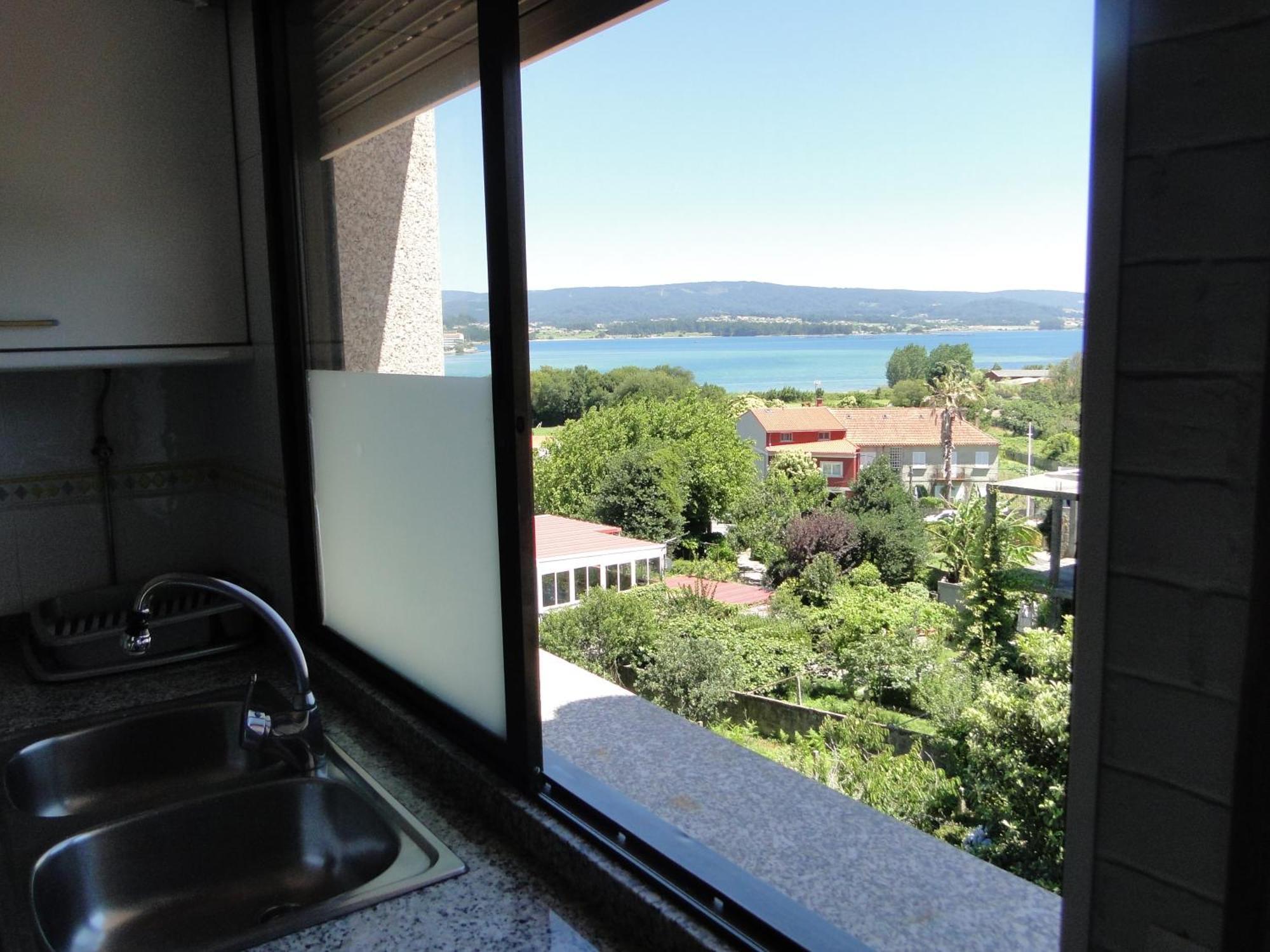 Apartamentos Blanco O Grove Exteriör bild