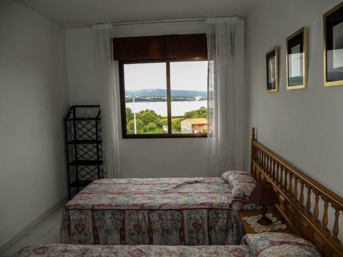 Apartamentos Blanco O Grove Exteriör bild
